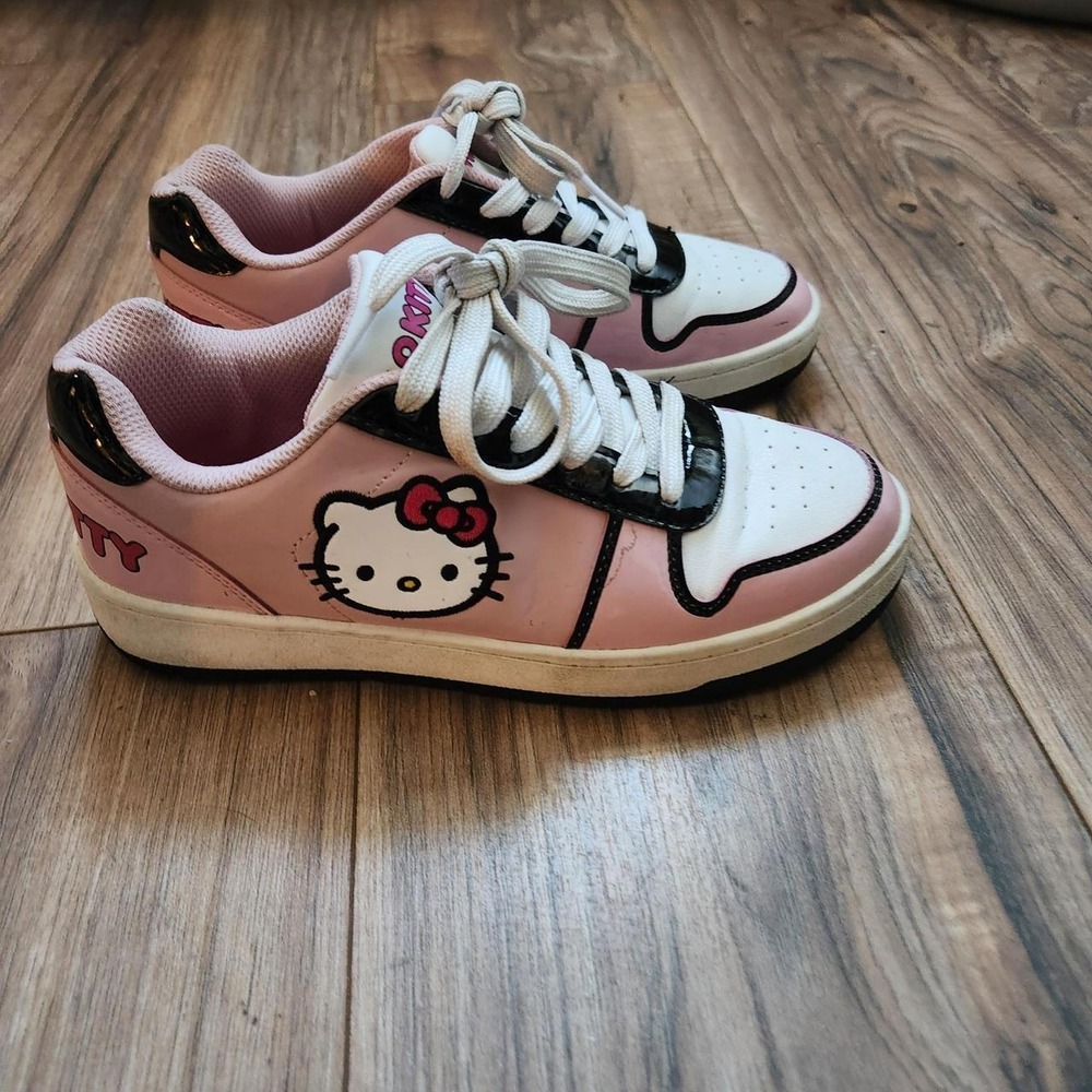 Hello Kitty pink and white sneakers with black accents